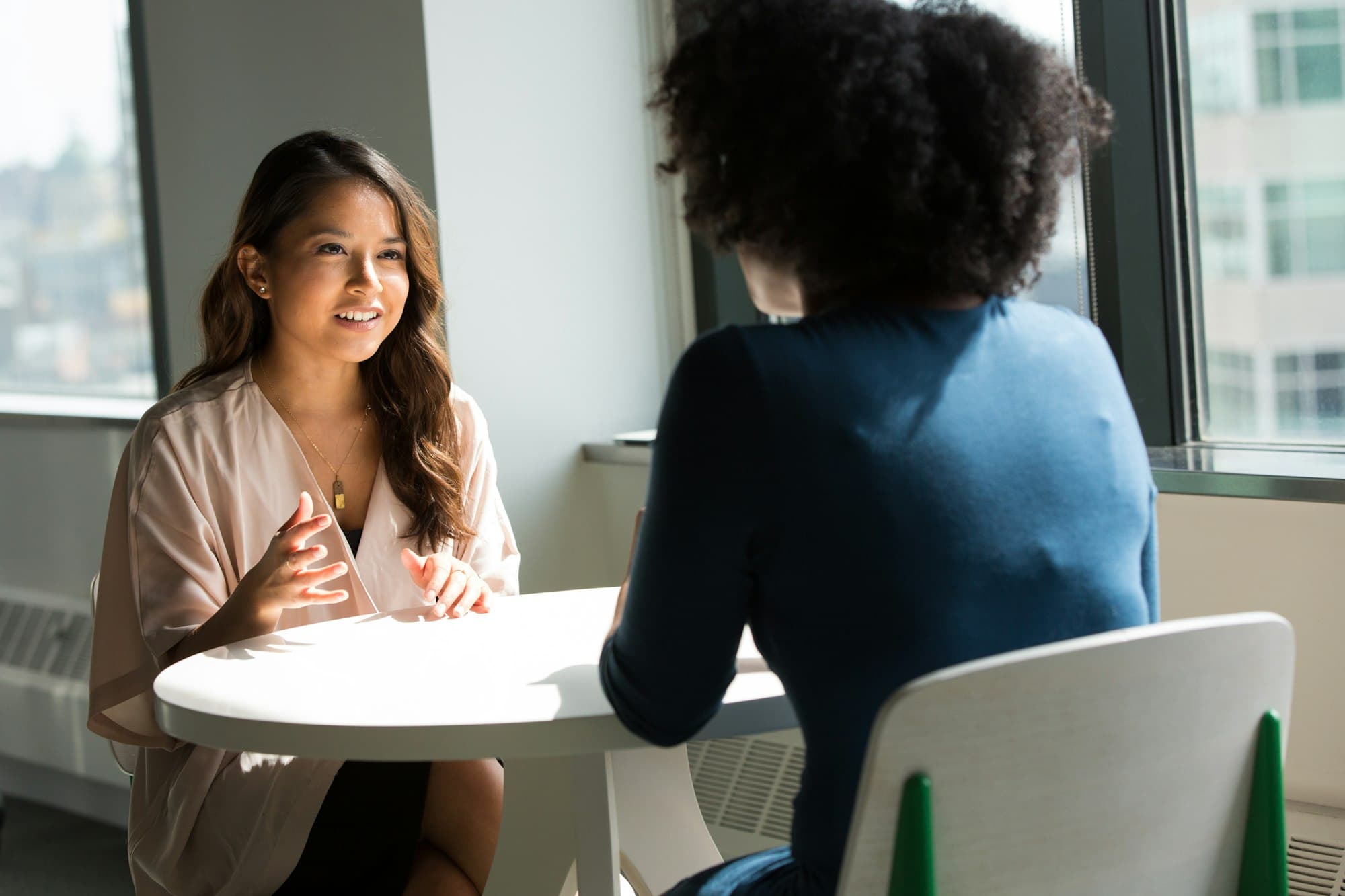 A client and counselor in a relaxed one-on-one conversation